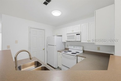 Welcome to this beautifully updated 3-bedroom, 2-bath villa - photo 10