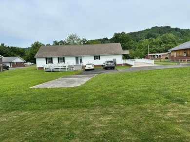 Spacious, Accessible One-Level Living with Extensive Upgrades! - photo 2