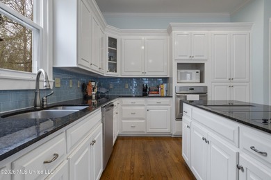 This two-story Coastal Southern Style home is nestled in a - photo 12