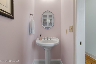 This two-story Coastal Southern Style home is nestled in a - photo 19