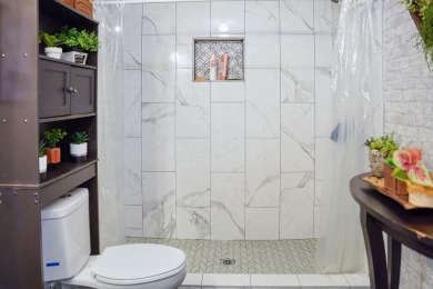 1.4 acres, this doublewide manufactured home offers four