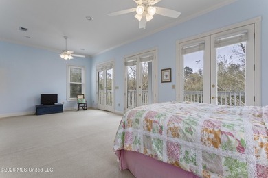 This two-story Coastal Southern Style home is nestled in a - photo 33
