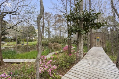 This two-story Coastal Southern Style home is nestled in a - photo 39
