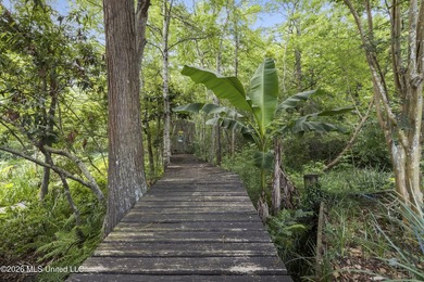 This two-story Coastal Southern Style home is nestled in a - photo 40