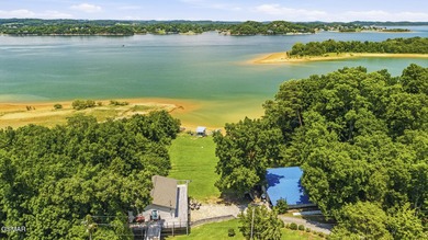 MAIN CHANNEL LAKEFRONT WITH TWO DWELLINGS & 182+ FT OF WATER - photo 2
