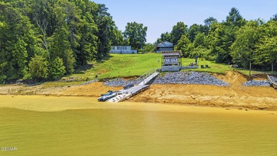 MAIN CHANNEL LAKEFRONT WITH TWO DWELLINGS & 182+ FT OF WATER - photo 4