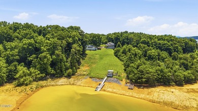 MAIN CHANNEL LAKEFRONT WITH TWO DWELLINGS & 182+ FT OF WATER - photo 7