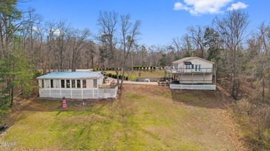 MAIN CHANNEL LAKEFRONT WITH TWO DWELLINGS & 182+ FT OF WATER - photo 10