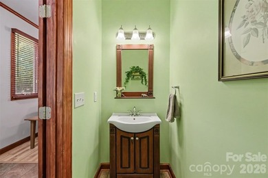 Tucked away on over 4 private wooded acres in the desirable - photo 16