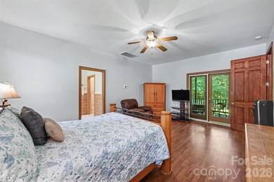 Tucked away on over 4 private wooded acres in the desirable - photo 18