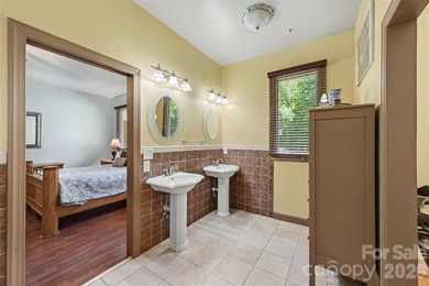 Tucked away on over 4 private wooded acres in the desirable - photo 20