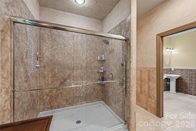 Tucked away on over 4 private wooded acres in the desirable - photo 21