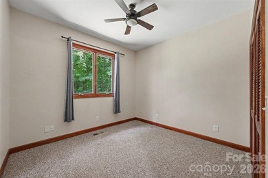 Tucked away on over 4 private wooded acres in the desirable - photo 24