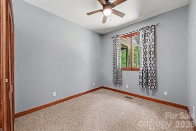 Tucked away on over 4 private wooded acres in the desirable - photo 26