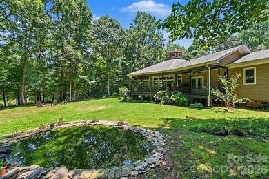 Tucked away on over 4 private wooded acres in the desirable - photo 34