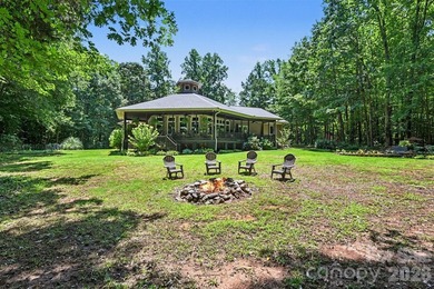 Tucked away on over 4 private wooded acres in the desirable - photo 35