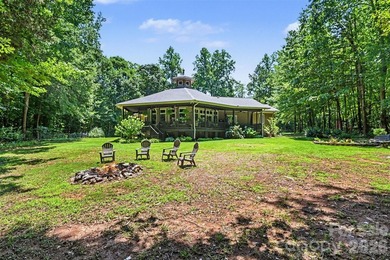 Tucked away on over 4 private wooded acres in the desirable - photo 36