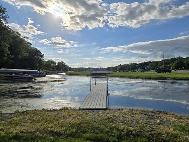 WATERFRONT HOME WITH DOCK AND A DEEDED SLIP IN THE EAST MARINA - photo 24
