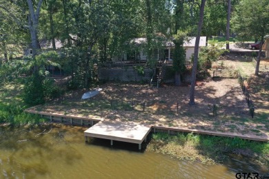 What an opportunity! Location, Location, Location! Come fall in - Lake Home For Sale in Hideaway, Texas