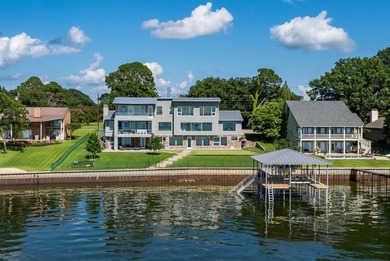 This is the lake house everyone has been waiting for. Positioned - photo 1