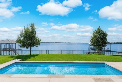 This is the lake house everyone has been waiting for. Positioned - photo 3