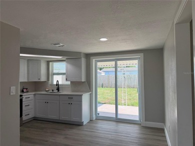 PORT RICHEY, FL. This modern home is located in the sought-after - photo 7
