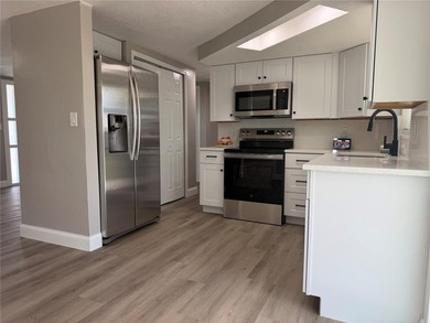 PORT RICHEY, FL. This modern home is located in the sought-after - photo 8