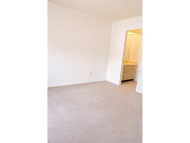 Welcome to this inviting second-floor condo located in the - photo 6