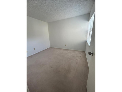 Welcome to this inviting second-floor condo located in the - photo 9