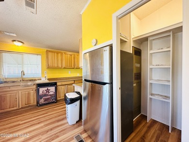 Step into this vibrant manufactured home just minutes from the