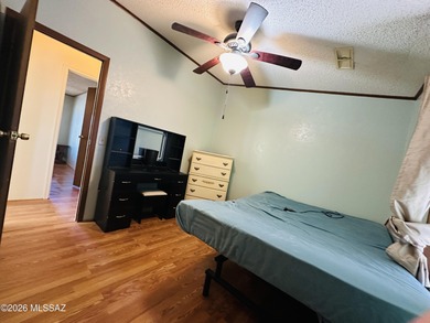 Step into this vibrant manufactured home just minutes from the