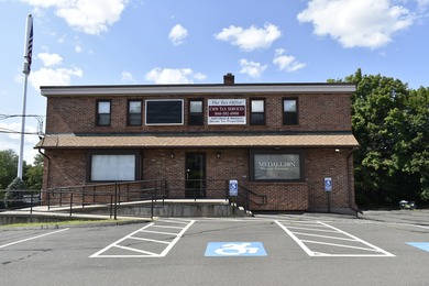 office/commercial building on 0.62 acre lot. High visibility and