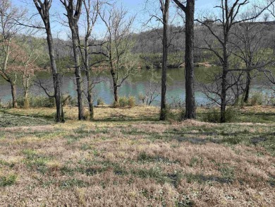 This RV-accessible riverfront lot offers 131 feet of prime - photo 3