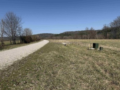 This RV-accessible riverfront lot offers 131 feet of prime - photo 6