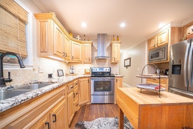 Located in the sought-after Tall Tree subdivision just across - photo 11