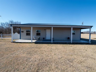 Modern Charm Meets Country Calm. This like-new 2BD/1BA home on - photo 3