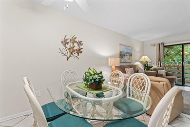 Tucked among mature landscaping in the highly desirable gated - photo 7