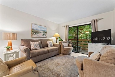 Tucked among mature landscaping in the highly desirable gated - photo 10