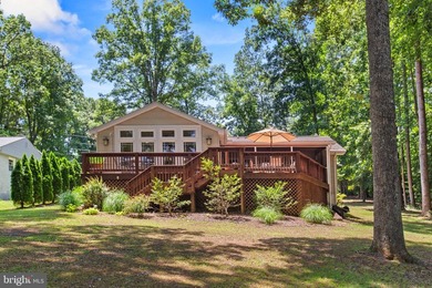 Welcome to 322 Lake Caroline Drive, where every day feels like a - photo 6