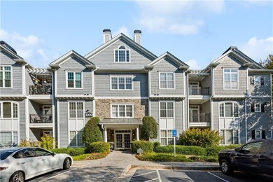 Welcome to this charming, light-filled condominium conveniently