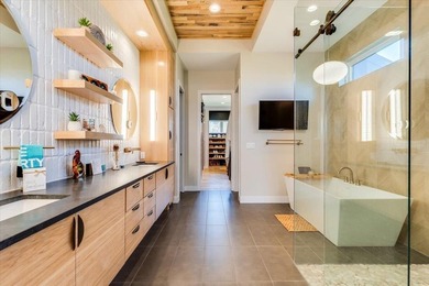 Set on nearly an acre in Emerald Bay, this exceptional luxury - photo 14