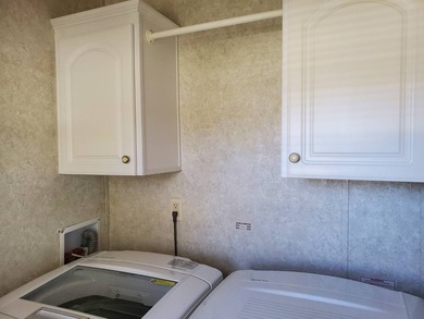 THIS HOME IS ON LEASED LAND WITH A MONTHLY LOT RENT OF $613 AND - photo 22
