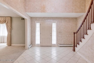Welcome to this spacious 6-bedroom, 4.5-bath home offering over - photo 6