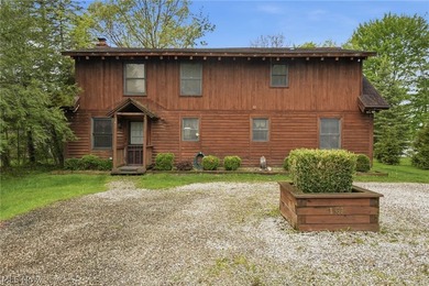 This cozy Lake front home with the warmth & charm of a private - photo 2