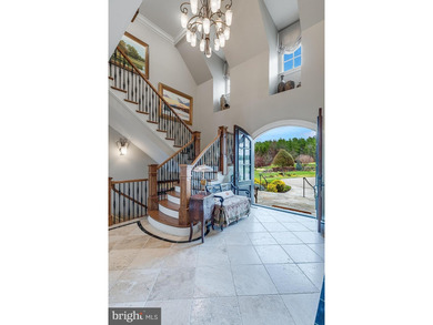 Welcome home to this remarkable estate set behind the gates of - photo 11
