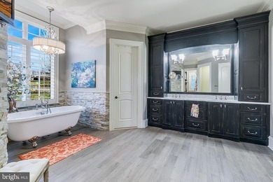 Welcome home to this remarkable estate set behind the gates of - photo 42