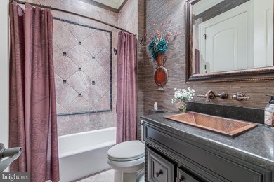 Welcome home to this remarkable estate set behind the gates of - photo 46