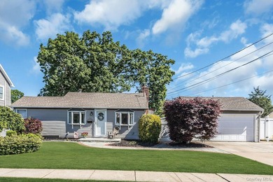 Spacious and sun filled this mid-block ranch has it all - photo 1