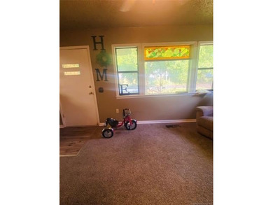 Located in Cleveland, Oklahoma, this charming residence is - photo 5
