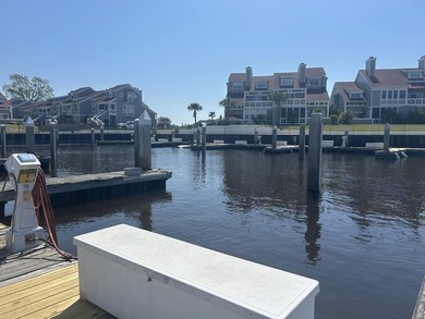Deeded 30' boat slip in the charming Nantucket style community - photo 1